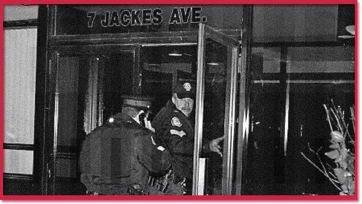 Photo of police entering the building where Henry Durost was murdered
